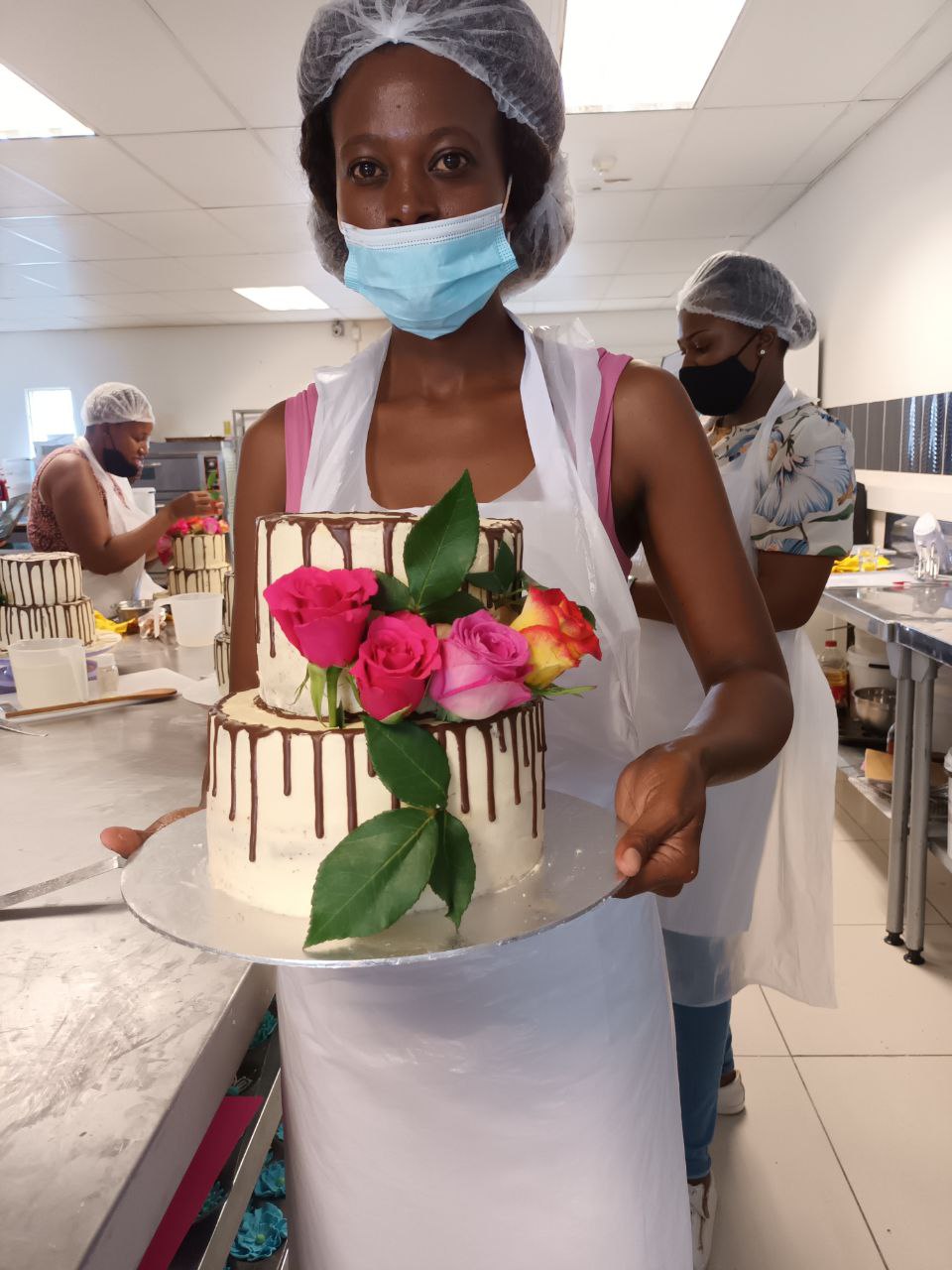 Bridget holding a cake